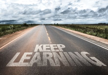 Keep Learning written on rural road-1